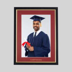 A high quality frame in Traditional Teak & Gold with a Crimson coloured, unique printed mount ready for your Cardiff University 10in x 8in graduation photo